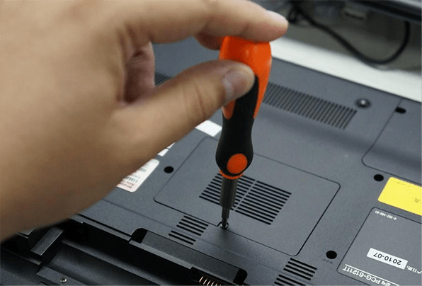 remove the screw on the memory cover with a screwdriver